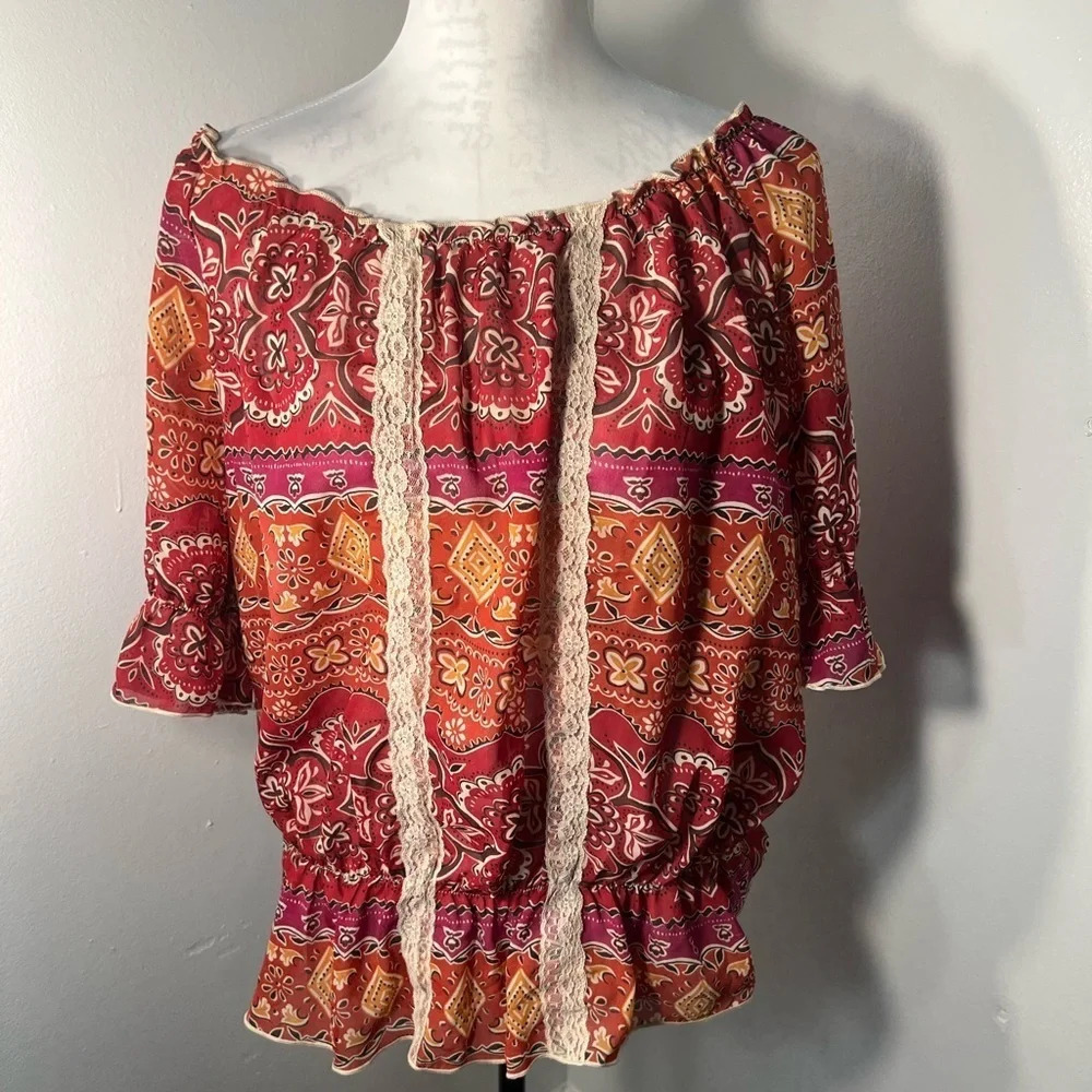 Lilly Lou top sz Lg. elastic and ruffled neckline‎ and drop waist line